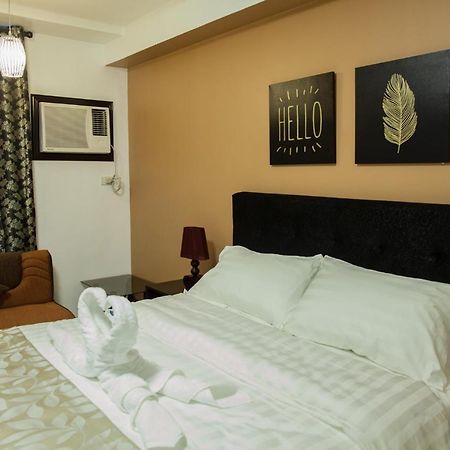 Melbourne Suites Макати Экстерьер фото