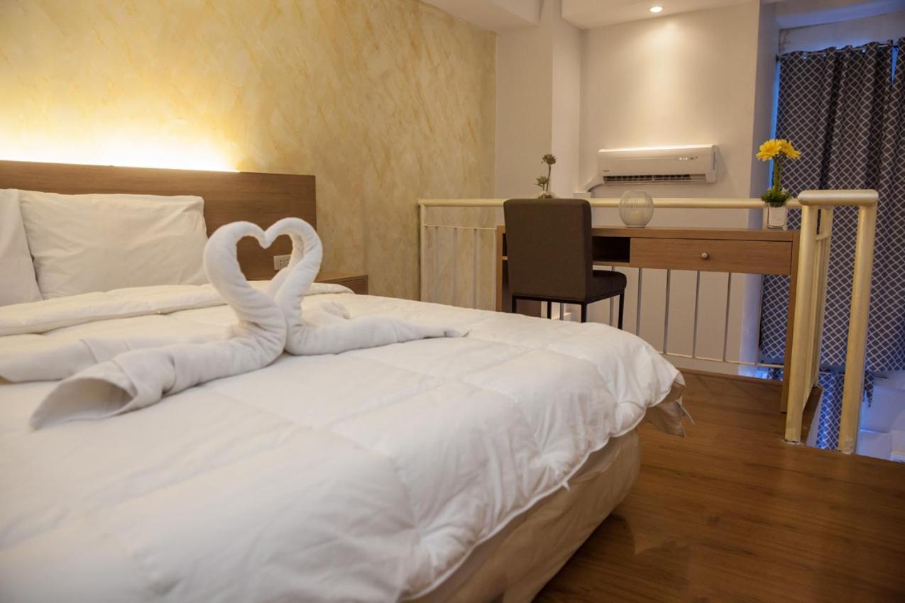 Melbourne Suites Макати Экстерьер фото